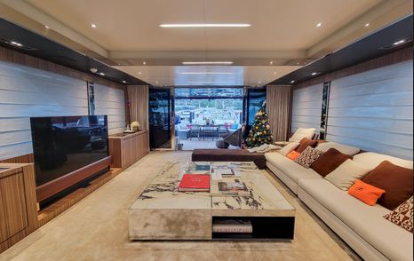 Superyacht 28 Monopoly's main deck seating area and Tv