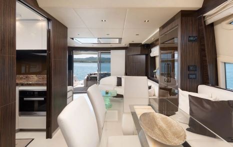 Dominator yacht Fradi saloon dining area and galley 