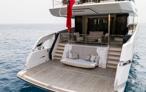 Sunseeker 82 Ocean Enclosed motor yacht stern with grey seating