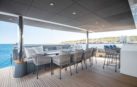 Superyacht Oscar's aft deck with alfresco dining 