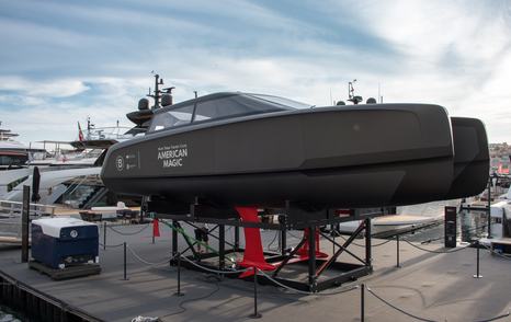 Tender boat on display at the Cannes Yachting Festival with American Magic on the side.