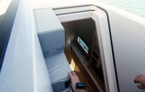 Aquila 45 Sport sliding steps opened to reveal cabin access below deck, showing dual-purpose foredeck walkway and entry system