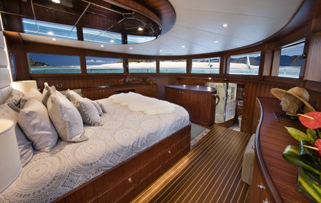 A guest cabin on board a Johnson 110 Skylounge yacht