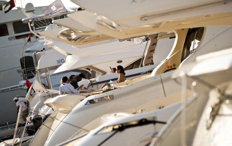 yacht broker yacht dealer on yacht in marina