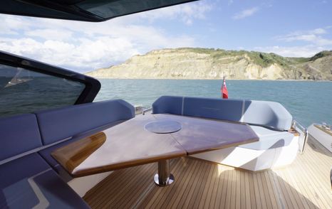 Fairline Targa 58 GTO cockpit dining table with aft seating