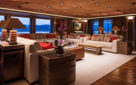 Superyacht Luna saloon with coffee tables and white sofas