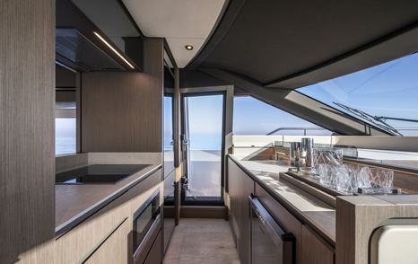 Ferretti 720 galley with extensive glazing 