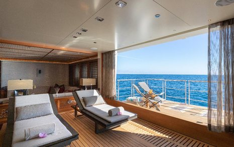 Spa environment onboard superyacht Quantum of Solace with fold down balcony and sun lounger.