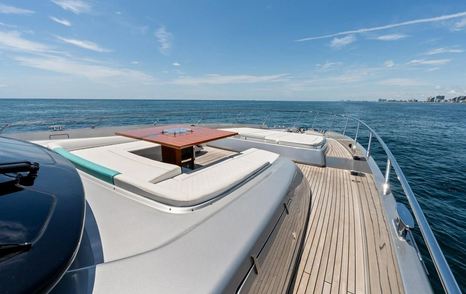 Riva motor yacht Tango Whiskey foredeck with dining area 