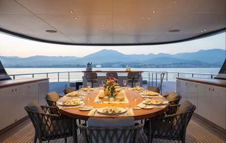 Superyacht Tosun sundeck shaded alfresco dining area
