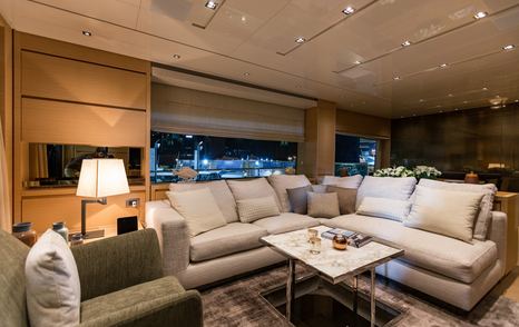 Dimly lit interior of luxury motor yacht