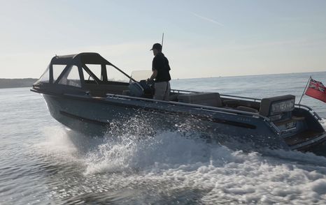 Evene Origin 71 underway with optional spray dodger raised