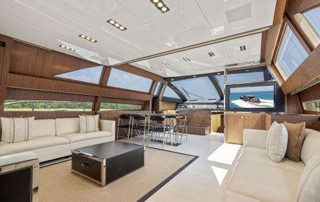 Riva motor yacht Indiscretion main saloon lounge and dining area 