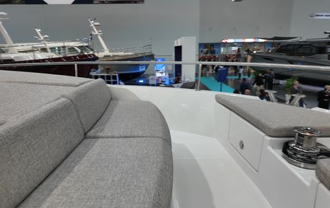 Greenline 42 foredeck seating detail with cushioned bench and guardrails