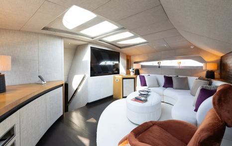 Pershing yacht Soraya cinema room with white sofas 