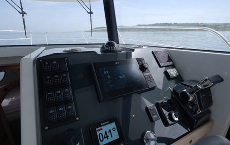 Lower helm controls with optional larger MFD on the Beneteau Swift Trawler 37 Fly