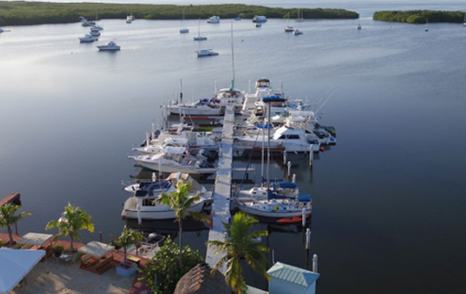 Moorings at Mangrove Marina – FL Keys, boats moored, surrounded by sea