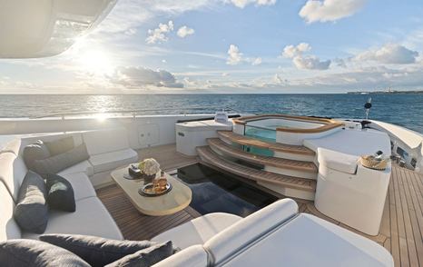 Superyacht Moonraker's upper deck jacuzzi and C-shaped seating