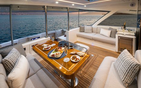 Riviera 645 SUV Series II motor yacht aft deck with alfresco dining