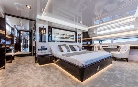 A guest cabin on board a Pearl 95 luxury yacht.