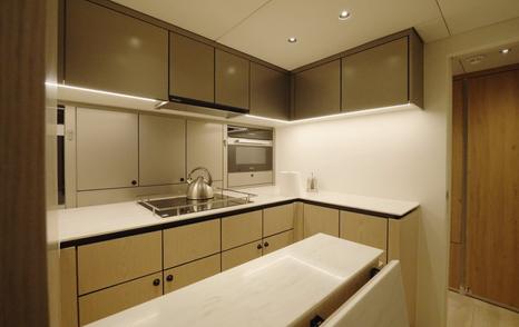 Sunreef Ultima 88 lower galley with extended worktop and fitted cabinetry