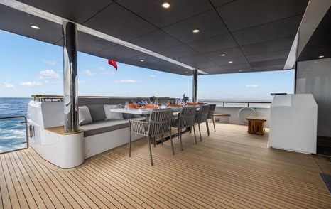 Superyacht Evelyn P's main aft deck with alfresco dining