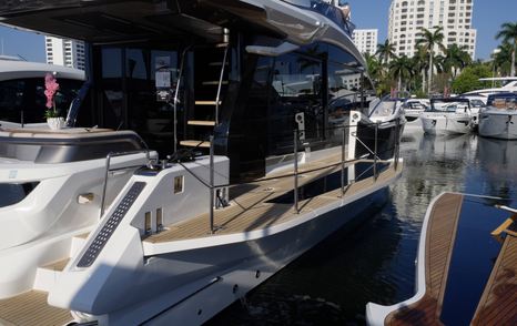 Galeon 520 Fly side profile with Beach Mode balconies deployed and extended deck space