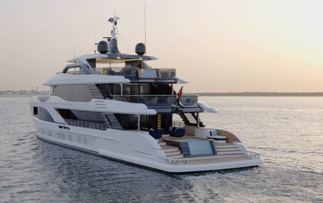 Stern view of the Gulf Craft Majesty 145 highlighting the beach club, pool terrace and aft decks
