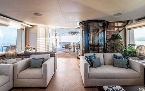 Interiors onboard sportsfisher yacht SPECIAL ONE with plush seating and elevator