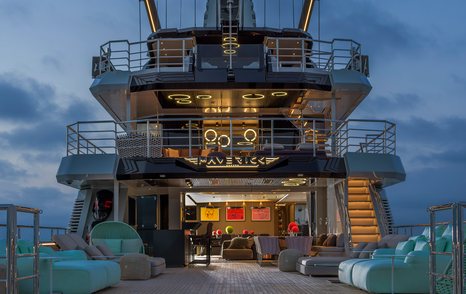Aft deck view of superyacht MAVERICK at dusk