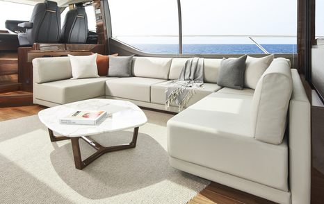 The contemporary lounging area on board a Princess V78 superyacht