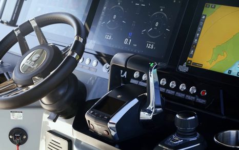 Aquila 45 Sport helm console with Mercury controls, twin throttle setup and navigation displays