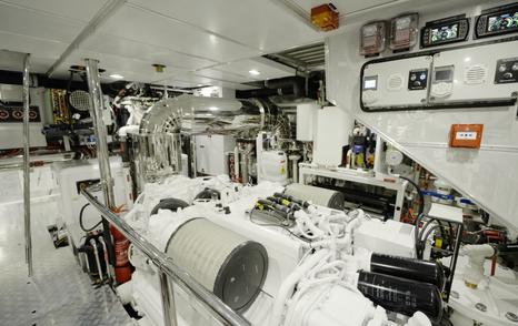 Twin MTU diesel engines in the Gulf Craft Majesty 100 Terrace engine room with wide central walkway