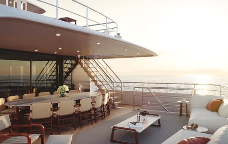 Heesen 55m Steel Superyacht Frida main aft deck with shaded alfresco dining