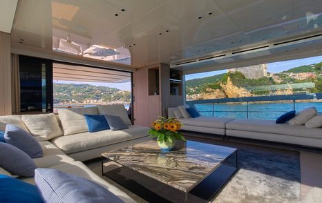 Motor yacht Estia's main saloon with window seating