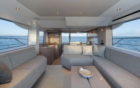 Sunseeker Manhattan 56 motor yacht saloon L-shaped grey seating