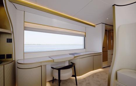 Vanity area and panoramic window in the Gulf Craft Majesty 100 Terrace owner's suite