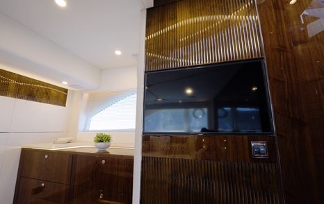 Television and vanity unit in the Fairline Targa 47 GT owner's cabin