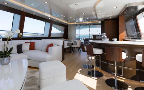 Mangusta yacht Firefly main saloon with bar 