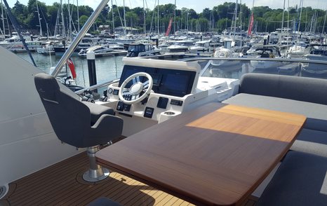 View across yacht with yachts moored in background