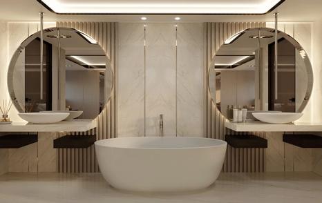 Elegant marble bathroom showing sink and mirrors