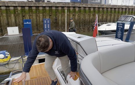 Princess S65 Mk2 aft deck with crew cabin access beneath the sunpad