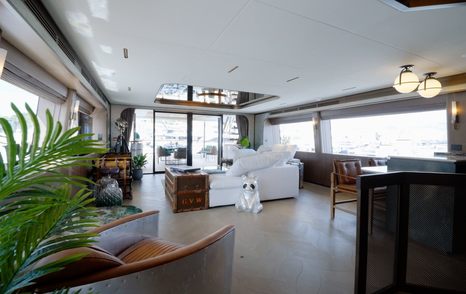Sirena 118 main saloon with panoramic glazing and loose lounge furniture