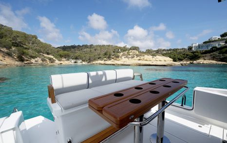 Aiata-Wayfinder-38-Suntop-Review-aft-cockpit-seating-with-folding-table