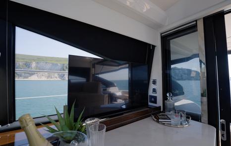 Pop up television in the Fairline Targa 47 GT with cockpit access door