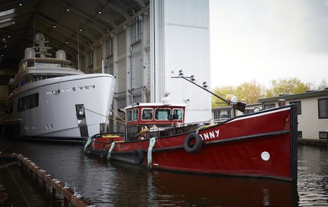 Feadship CALLISTO being escorted out of hanger at Feadship facility.