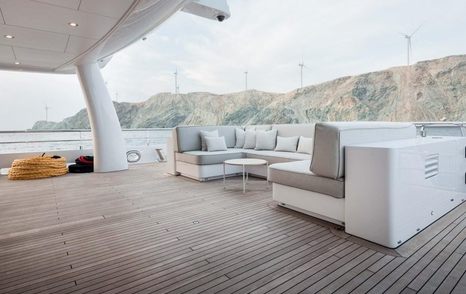 Superyacht Stella MI upper deck U-shaped grey seating area 