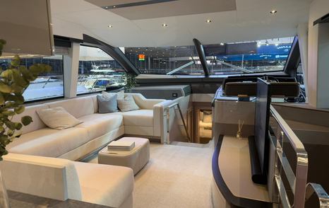 Interior U-shaped sofa onboard Sunseeker Manhattan 68