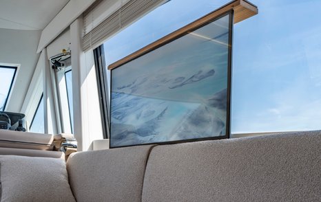 Solaris-Power-60-Coupe-Review-saloon-side-window-and-sofa-with-rising-TV