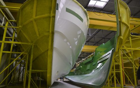 The hull of an Arcadia Sherpa XL yacht in a shed